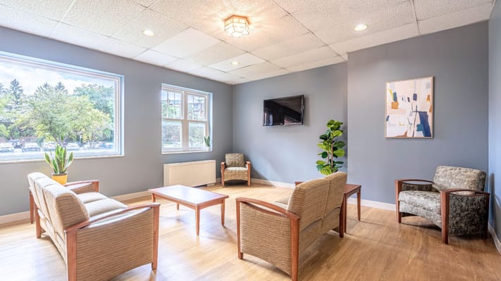 Bright and inviting common area with seating
