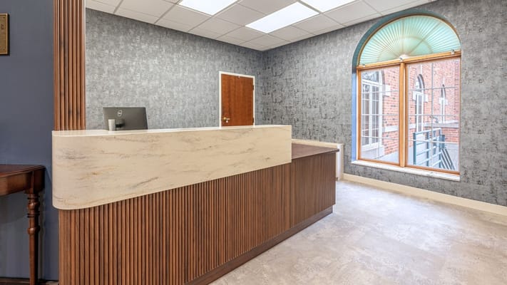 Reception area with a modern front desk