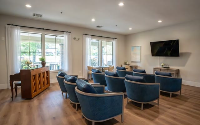 Interior common area with seating and piano