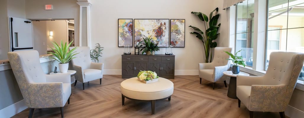 A cozy lobby area with comfortable seating and decor