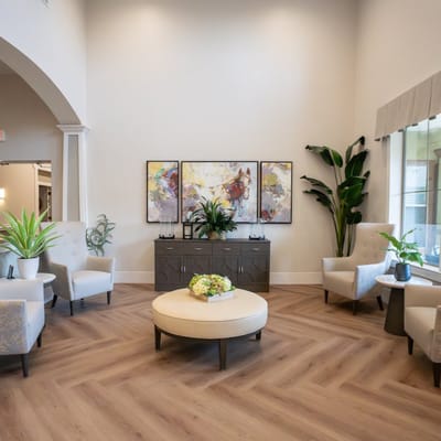 Common area with stylish seating and plants