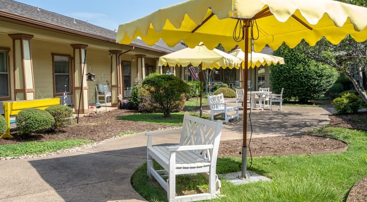 Outdoor seating area with umbrellas and benches