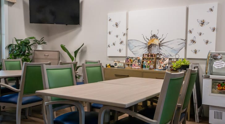 Bright common area with artistic decor and plants