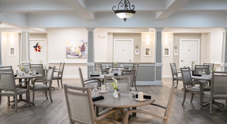 Bright dining room setup with tables and decor