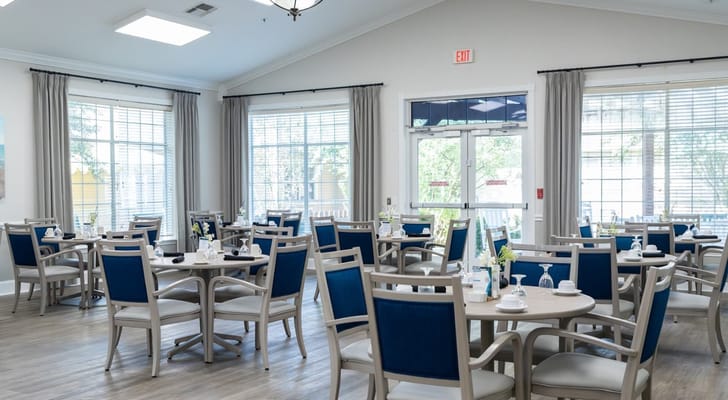 Bright dining room with neatly arranged tables and chairs
