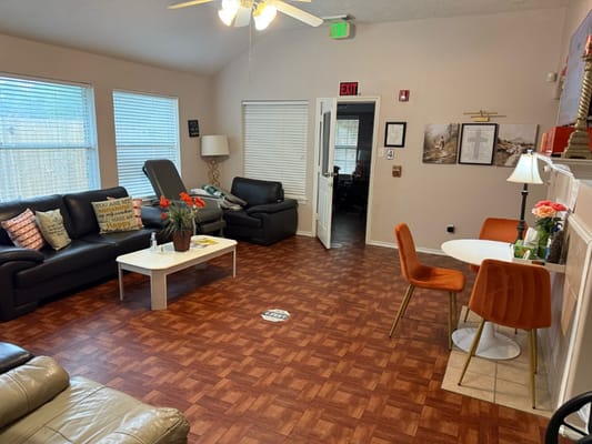 Common area with seating and dining space