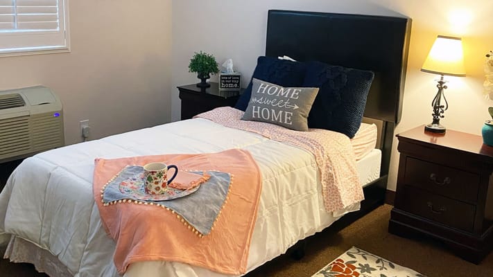 Cozy resident bedroom with home decor and a snack