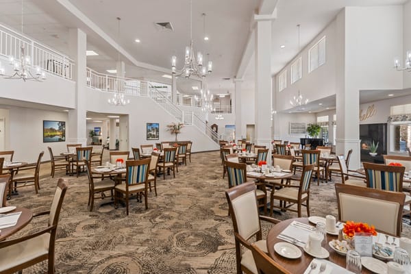 Dining room with tables set for breakfast at The Palms at La Quinta