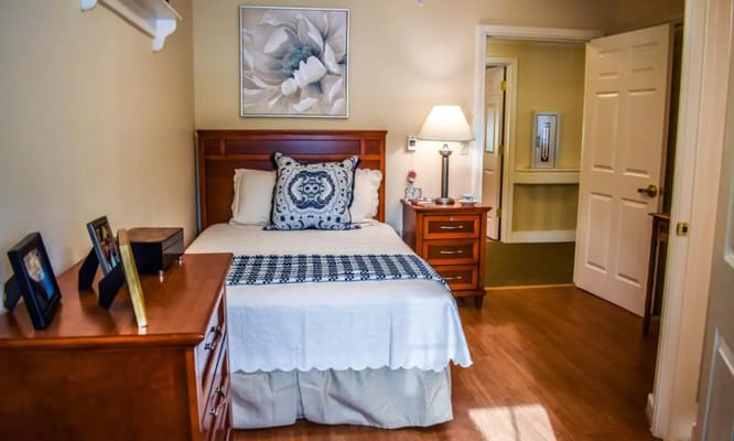 Cozy resident room with a bed and decor