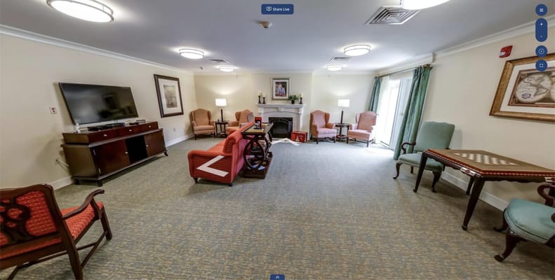 Common area with seating and fireplace