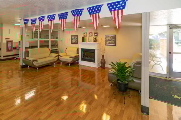 Interior view of a common area with seating and decorations