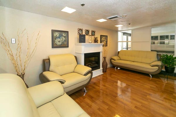 Interior common area with seating and fireplace