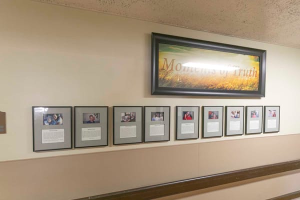 Gallery wall showcasing moments and residents at the facility