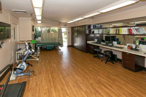 Interior view of a therapy room with equipment