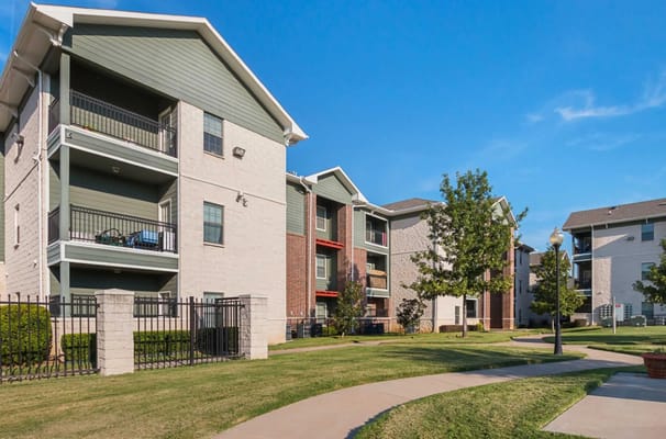 Exterior view of the Oak Timbers facility with green space