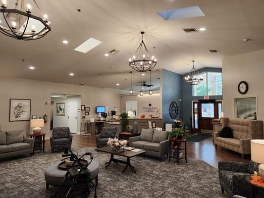 Bright and spacious lobby area with comfortable seating and decor.