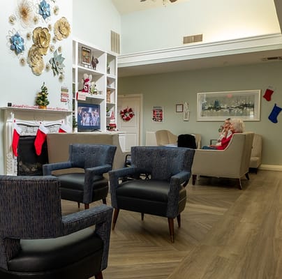 Interior common area with holiday decorations and residents