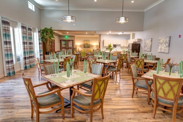 Elegant dining area with tables set for a meal