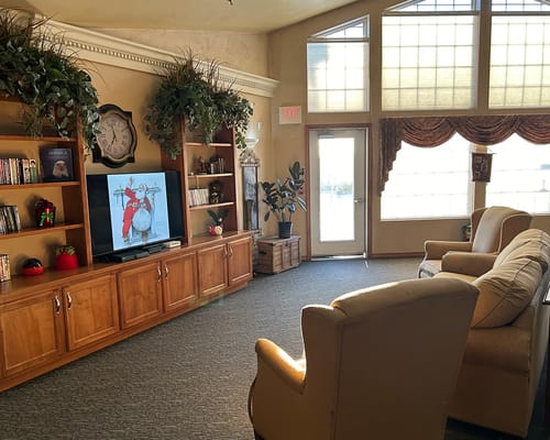 Common area with seating and a television