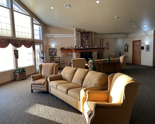Interior common area with seating and fireplace