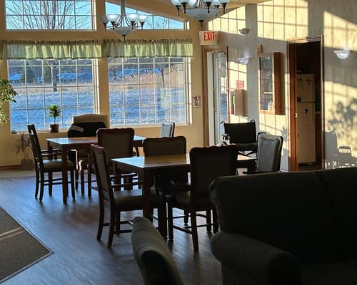 Interior common area with tables and chairs