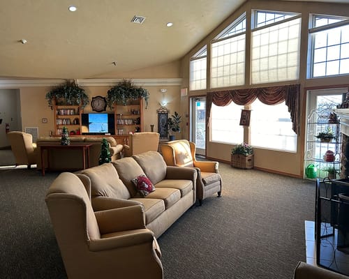 Cozy common area with seating and large windows
