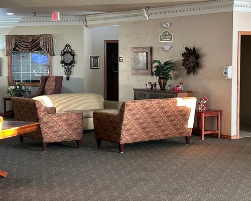 Common area seating with floral decorations