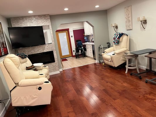 Cozy common area with recliner chairs and accessible features