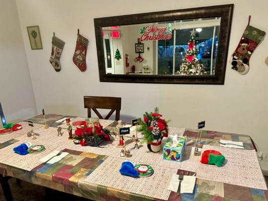 Festively decorated dining table with Christmas decorations