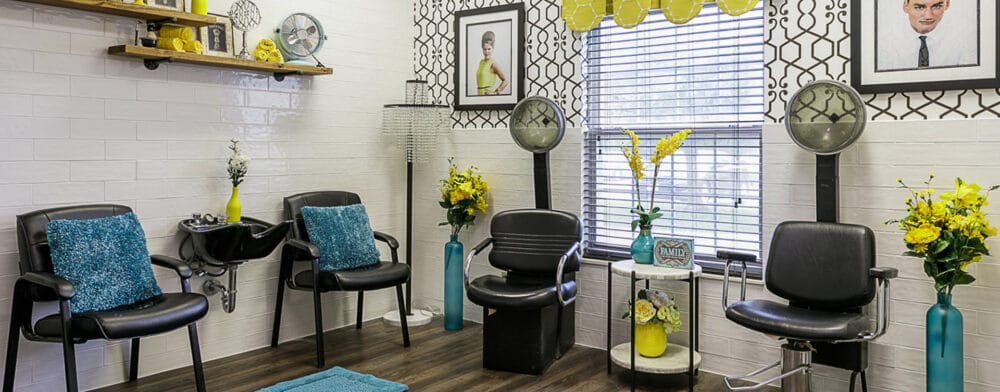 Hair salon with colorful decor and styling chairs