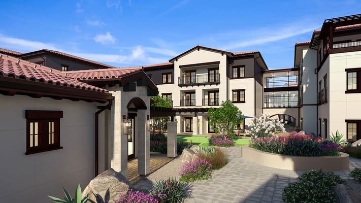Exterior view of a senior living facility with gardens