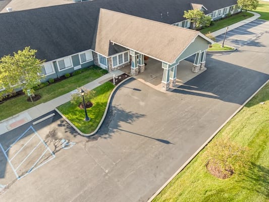 Aerial view of the facility's front entrance and parking area