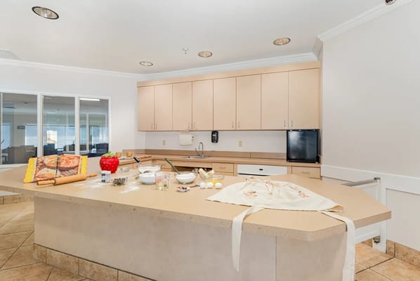 Interior kitchen area with food preparation items