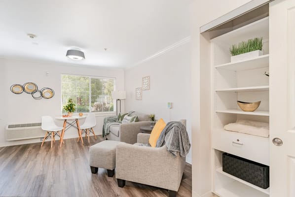 Cozy interior of a resident room with seating area