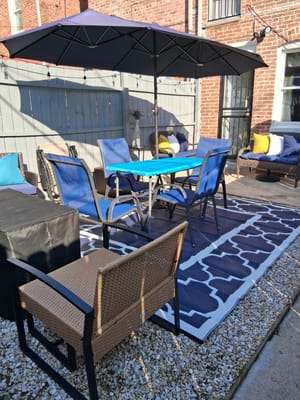 Outdoor seating area with chairs and tables