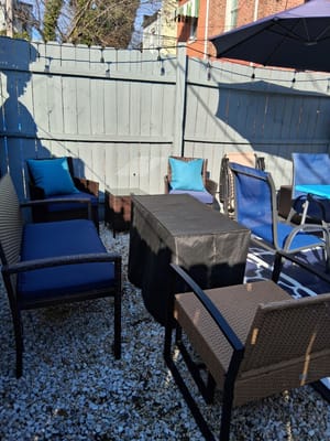 Outdoor seating area with chairs and tables