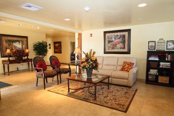 Bright common area with seating and decor