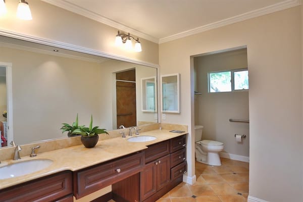 Bright and clean bathroom with double sinks