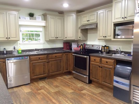 Bright kitchen area with modern appliances