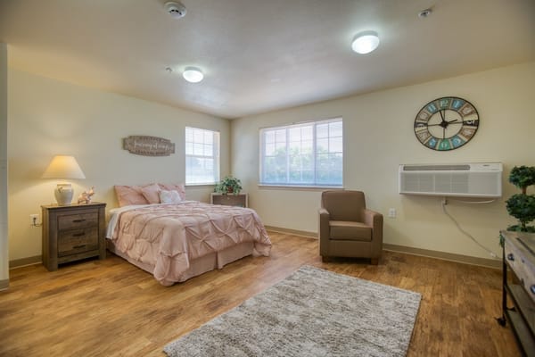 Comfortable private resident room with natural light