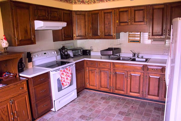 Interior view of a kitchen with wooden cabinets