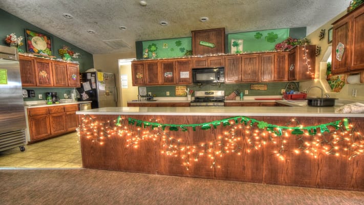 Interior view of a festive kitchen area with decorations
