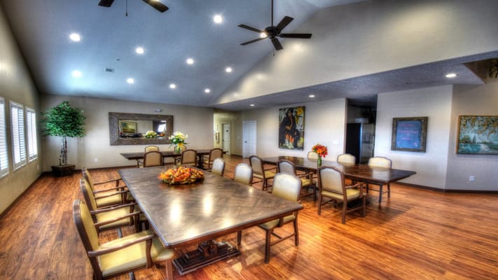 Bright common area with tables and chairs