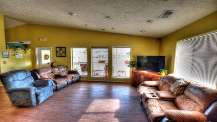 Common area with seating and large windows