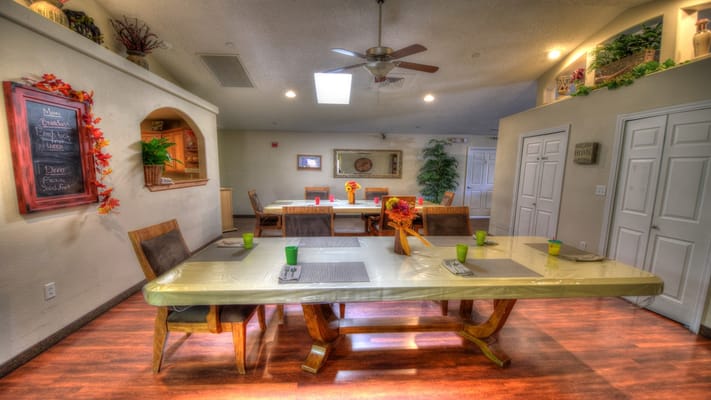 Bright dining area with tables and decorations