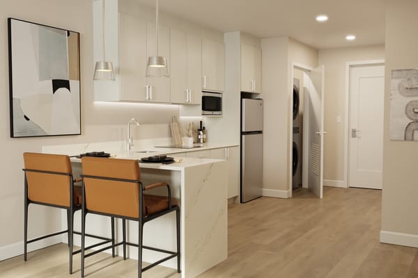 Modern kitchen area in a resident suite