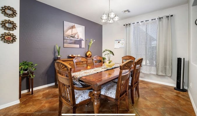 Bright dining room with wood dining table and decor