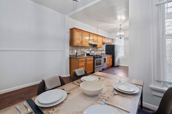 A well-lit kitchen area in an assisted living facility