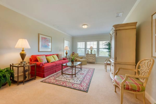 Cozy living room with red sofa and decorative elements