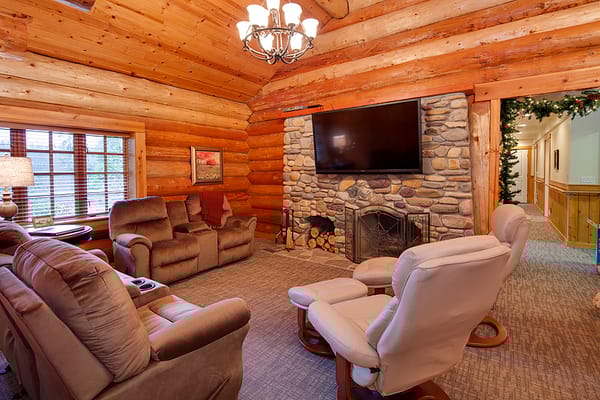 Cozy common area with comfortable seating and a fireplace